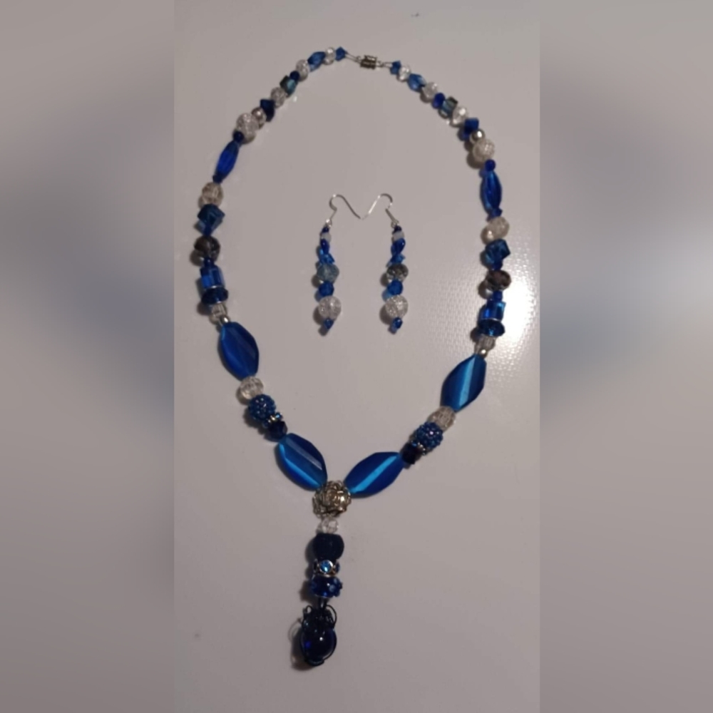 COPY - Hand crafted blue and white beaded necklace and earring set.
